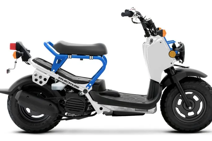 a motorcycle parked on the side of a road