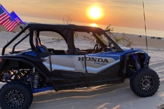 a truck that is driving down the road